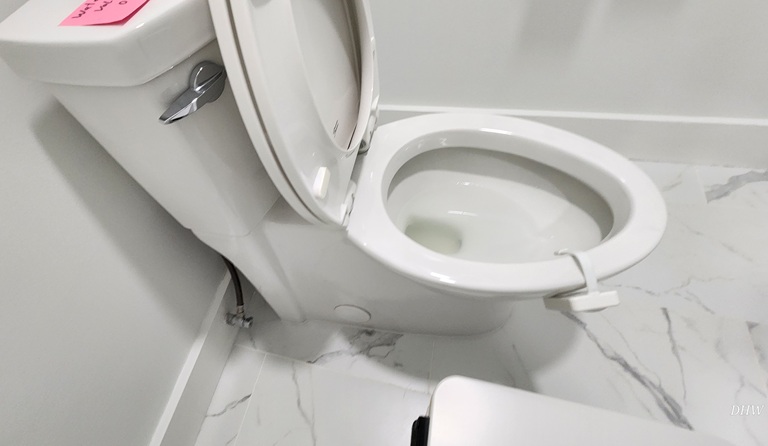 Every Senior Home Watch visit includes a thoughtful review of key areas — from doors, windows, and appliances to potential water leaks and weather impacts. It’s a thorough process aimed at preventing small issues from becoming major problems while you’re away. Bathroom toilet check during Senior Home Watch & Emergency Assist service, checking for leaks, water flow, and proper operation to prevent damage.